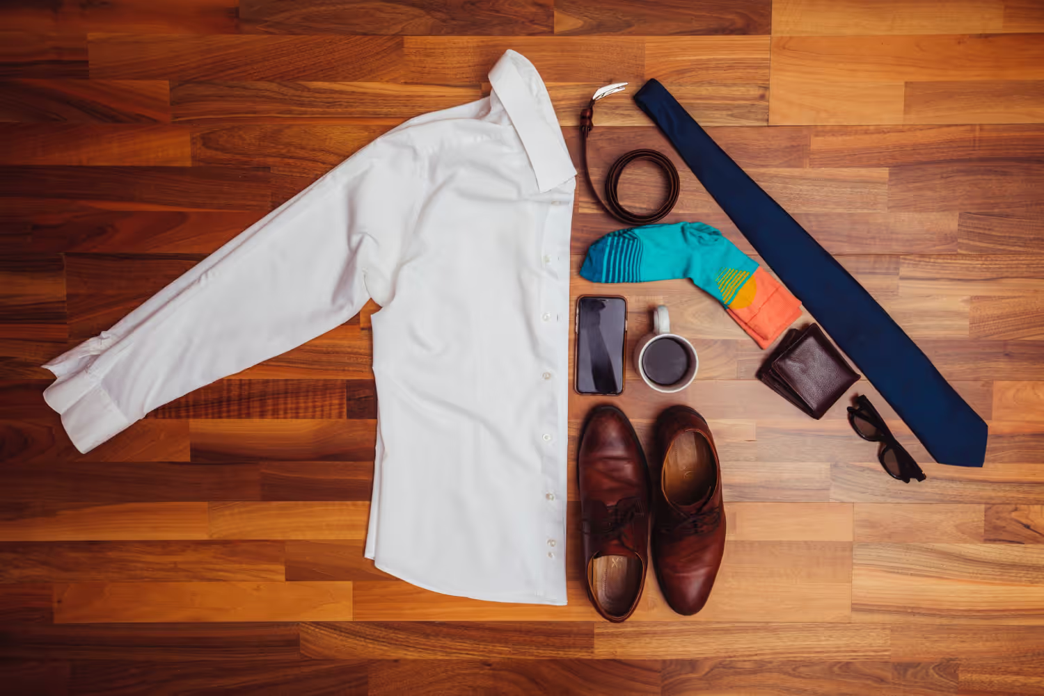 Color-coordinated outfit components demonstrating how a cohesive palette creates visual harmony, with neutral base pieces and complementary accent colors.